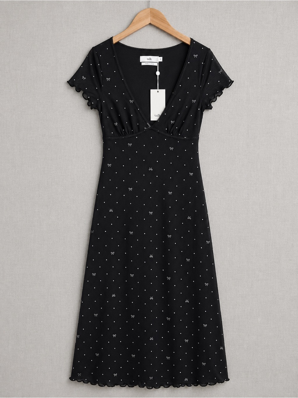 Twik Par Simon’s Black Short-Sleeve V-Neck Midi Dress with Subtle Dot/Bow Print